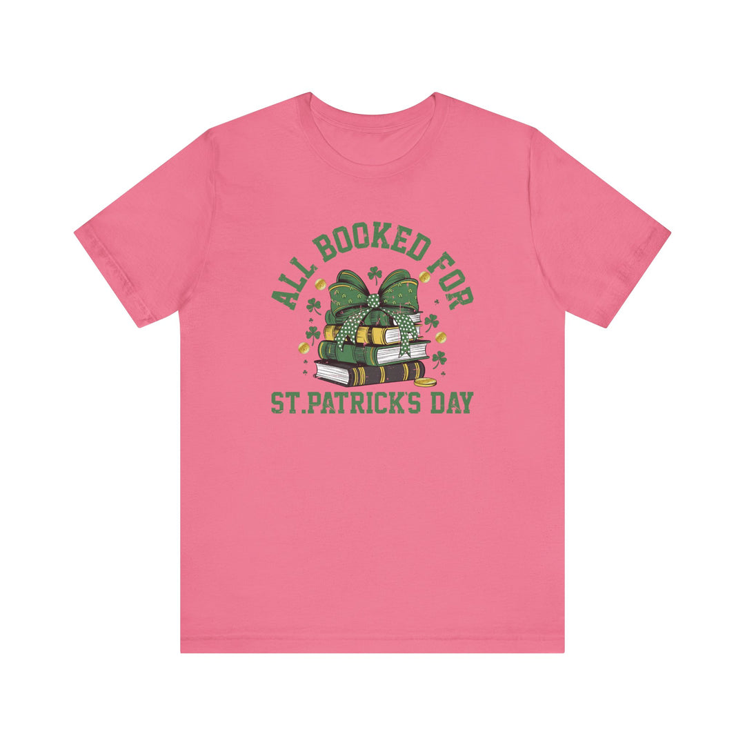 Booked for St. Patrick's Day Tee featuring green text on a pink unisex jersey with short sleeves, crafted from soft cotton for a comfortable fit.
