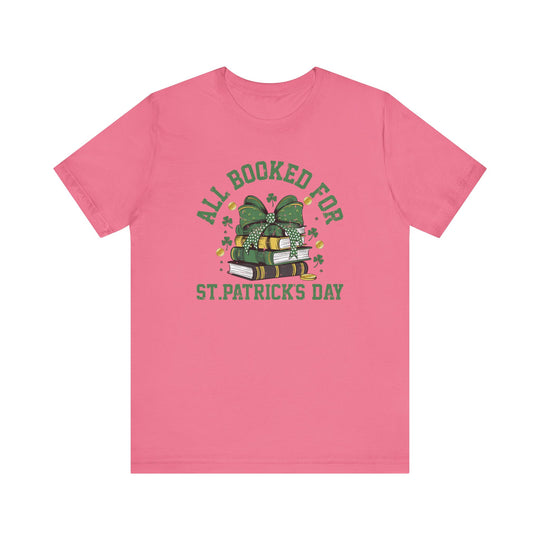 Booked for St. Patrick's Day Tee featuring green text on a pink unisex jersey with short sleeves, crafted from soft cotton for a comfortable fit.