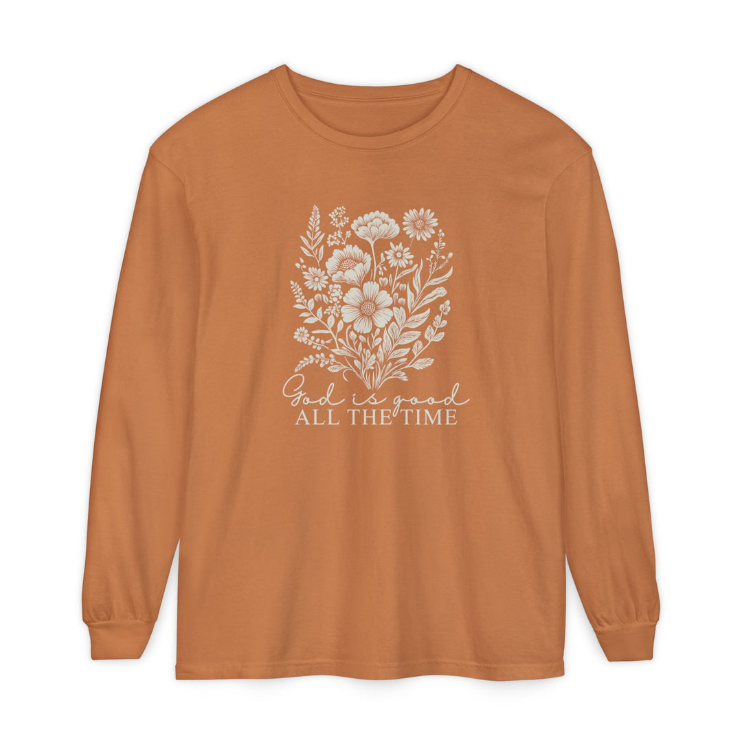 Rust-colored long-sleeve tee with floral silhouette and God is good ALL THE TIME text, offering a soft, relaxed fit for casual wear.