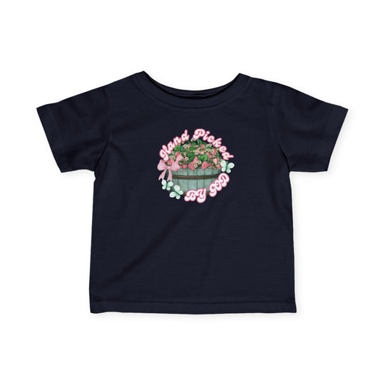 Hand Picked by GOD Baby Tee, a durable, soft infant jersey with ribbed knitting, side seams, and taped shoulders, providing comfort and a classic fit for toddlers.