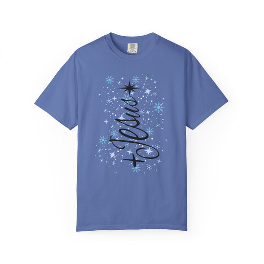 Jesus Tree Tee with Merry shaped like a Christmas tree, adorned with snowflakes and stars. Short-sleeve, periwinkle T-shirt from Faith Family Designs.