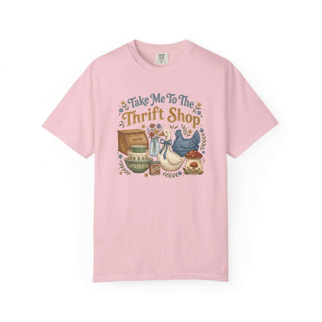Take Me To the Thrift Shop Tee featuring vintage-style illustrations of thrifted treasures in a whimsical wreath design, perfect for cozy, unique fashion.