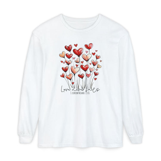 Love Never Fails Long Sleeve Tee featuring red and pink heart blossoms with Love never fails and 1 Corinthians 13:8 in script on soft, 100% ring-spun cotton.