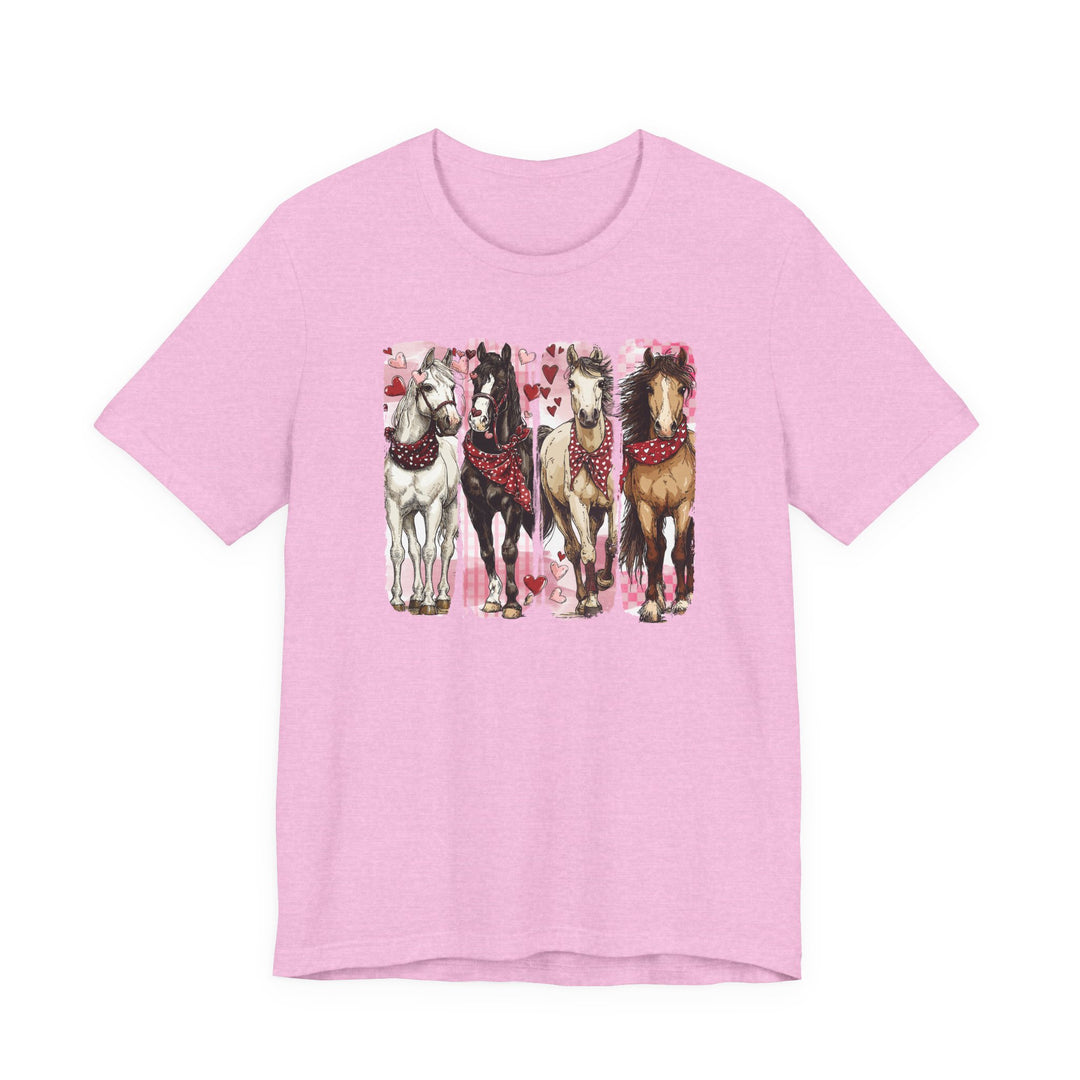Light pink Horse Valentine Tee with four horses in heart-patterned red bandanas, surrounded by pink and red hearts, offering a sweet, Valentine’s-inspired design.