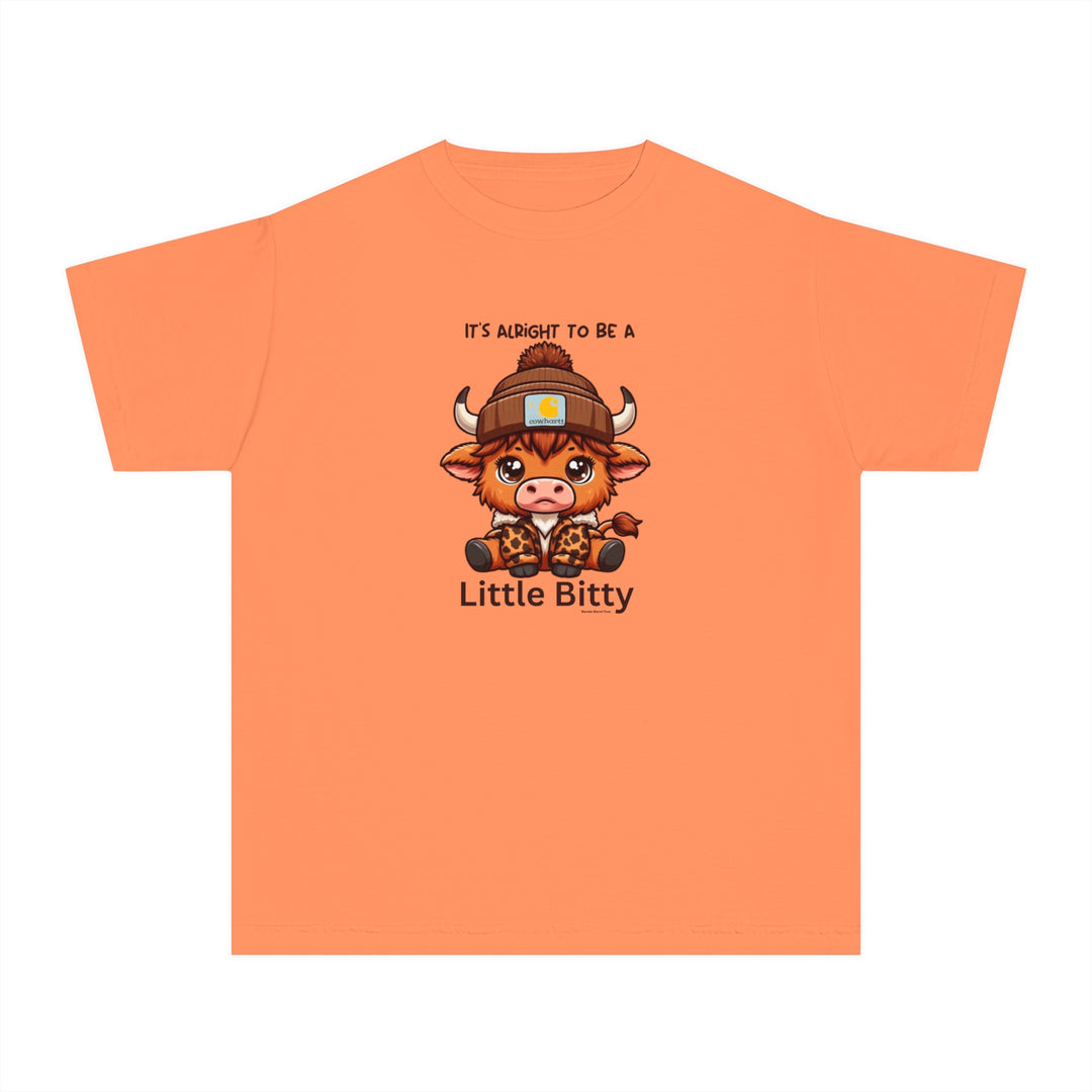 Little Bitty Kids Tee: A playful t-shirt featuring a cartoon cow design, perfect for active kids. Made of soft combed cotton for comfort and agility. Classic fit for all-day wear.