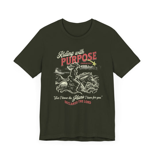 Riding for a Purpose Tee: Green t-shirt featuring a cowboy riding a horse graphic, made from soft cotton with a classic unisex fit.