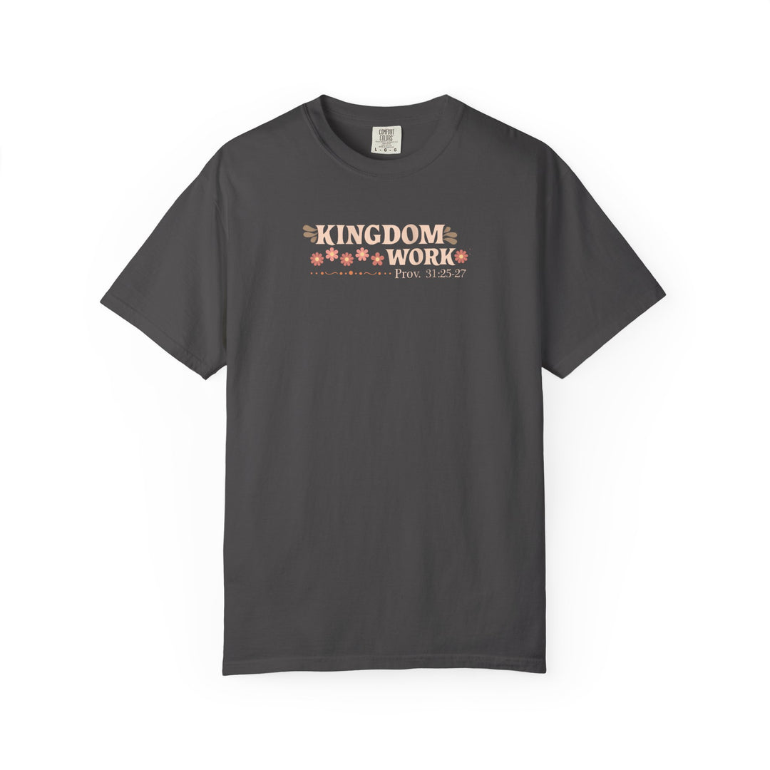 Charcoal-gray Kingdom Work tee with cream-peach lettering, peach flowers, and Prov. 31:25-27 reference. Relaxed fit, 100% cotton, size L.