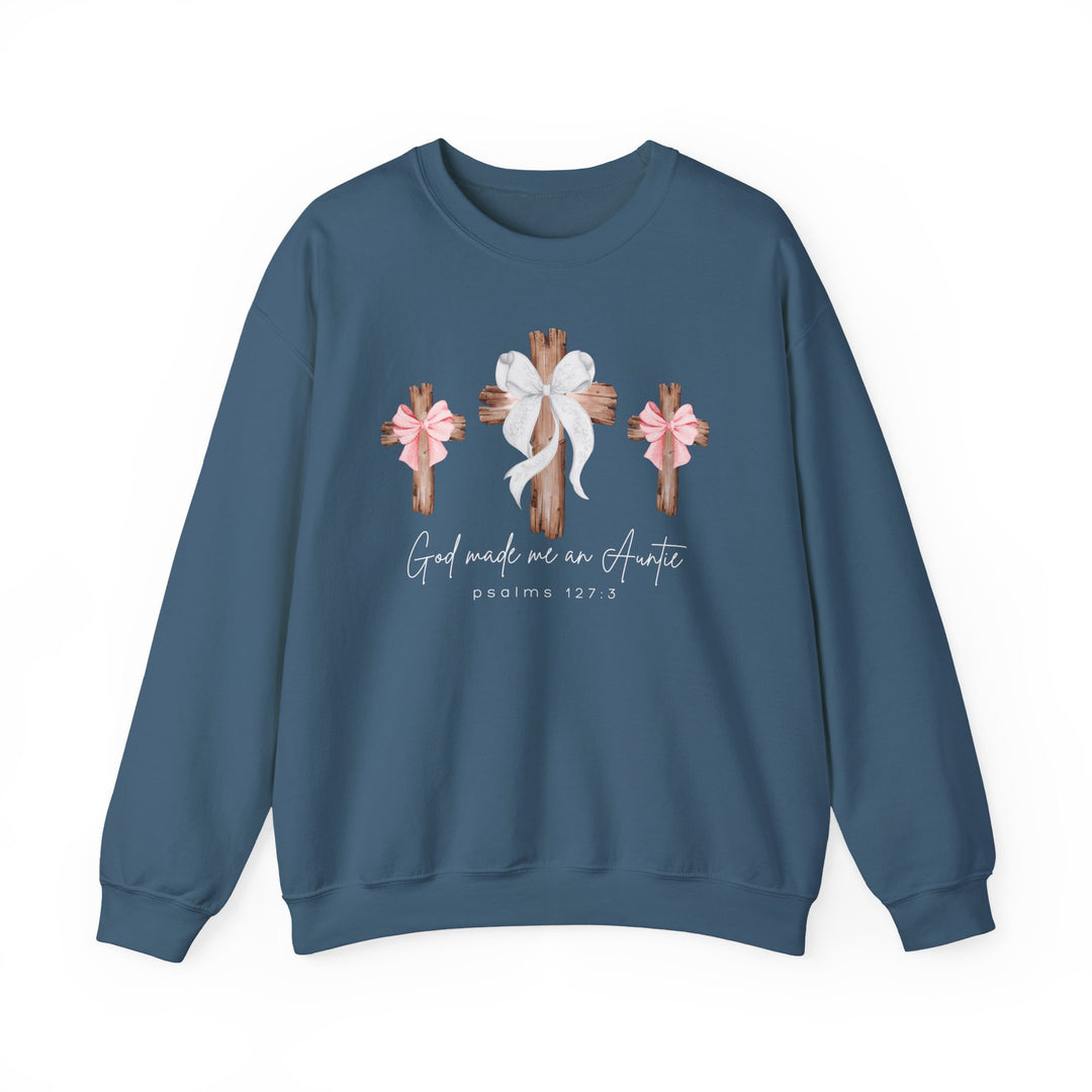 Blue crewneck sweatshirt featuring three rustic wooden crosses with bows and God Made Me a Girl Auntie text, embodying comfort and style from Faith Family Designs.