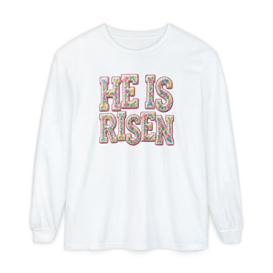 He is Risen Long Sleeve Tee with floral-patterned lettering, 100% ring-spun cotton, offering a relaxed fit for comfort and style.