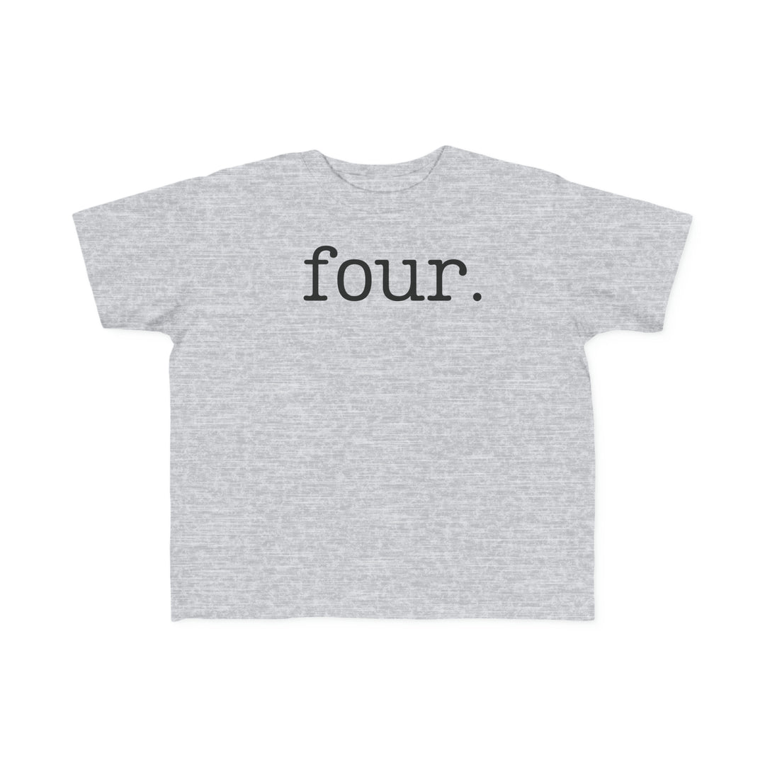 A toddler tee featuring a grey fabric with bold black text. Soft and gentle on sensitive skin, made of 100% combed, ring-spun cotton. Perfect for little adventurers.