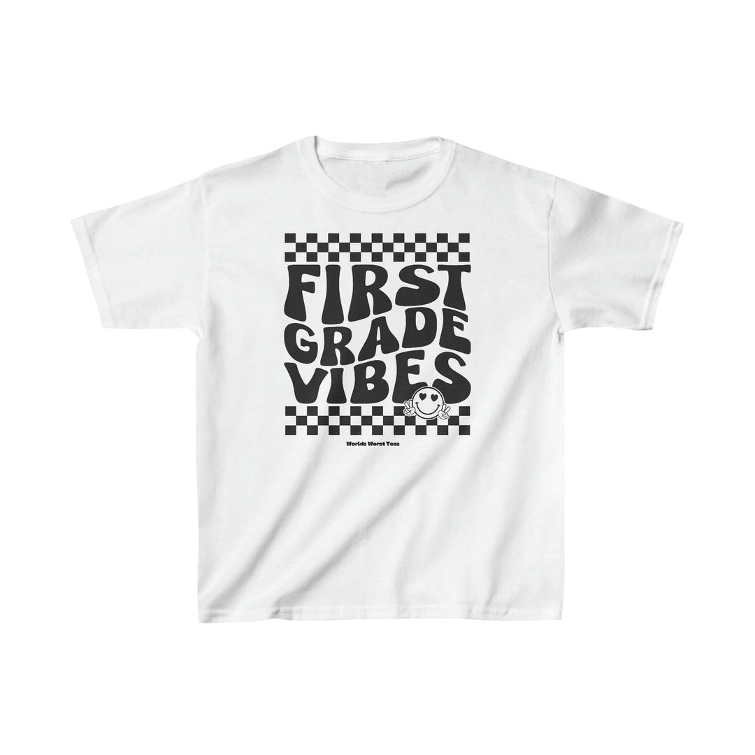 A kids' heavy cotton tee featuring 1st Grade Vibes text. Made of 100% cotton with twill tape shoulders for durability and ribbed collar for curl resistance. Classic fit, tear-away label, ideal for printing.