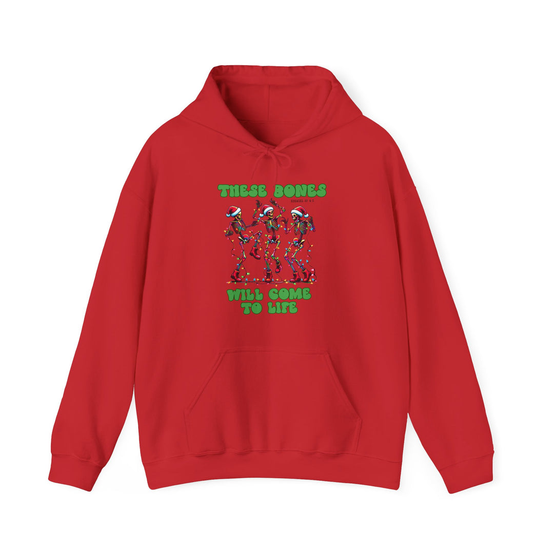 Bones Come to Life Hoodie featuring dancing skeletons in Santa hats with Christmas lights, chunky green text, kangaroo pocket, and drawstrings for stylish comfort.