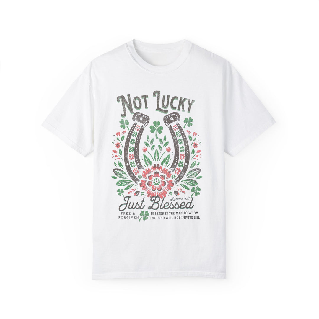Blessed Tee: White t-shirt featuring a graphic design with a horseshoe, flowers, and leaves. Made from soft, durable, ring-spun cotton for everyday comfort.