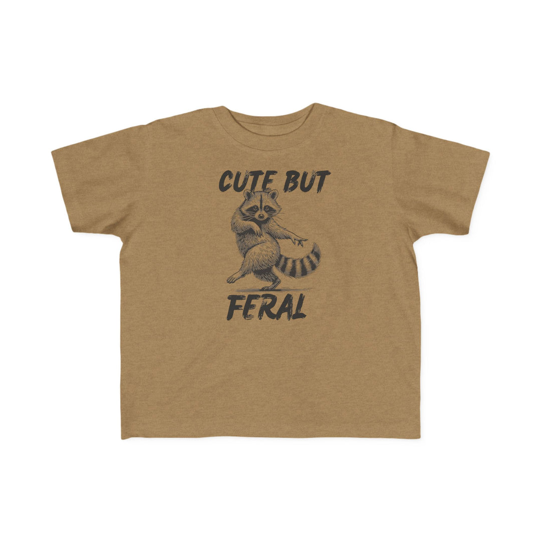 Cute but Feral Toddler Tee featuring a playful raccoon graphic, crafted from soft, durable cotton, perfect for toddlers' comfort and first adventures.