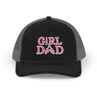 Girl Dad Snapback Trucker Cap with pink embroidery, featuring a black and grey design, adjustable snap closure, and breathable mesh back.