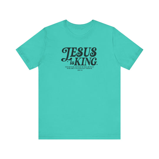 Jesus is King Tee, blue t-shirt with black text, unisex design, featuring soft cotton for comfort and durability with ribbed knit collars and dual side seams.
