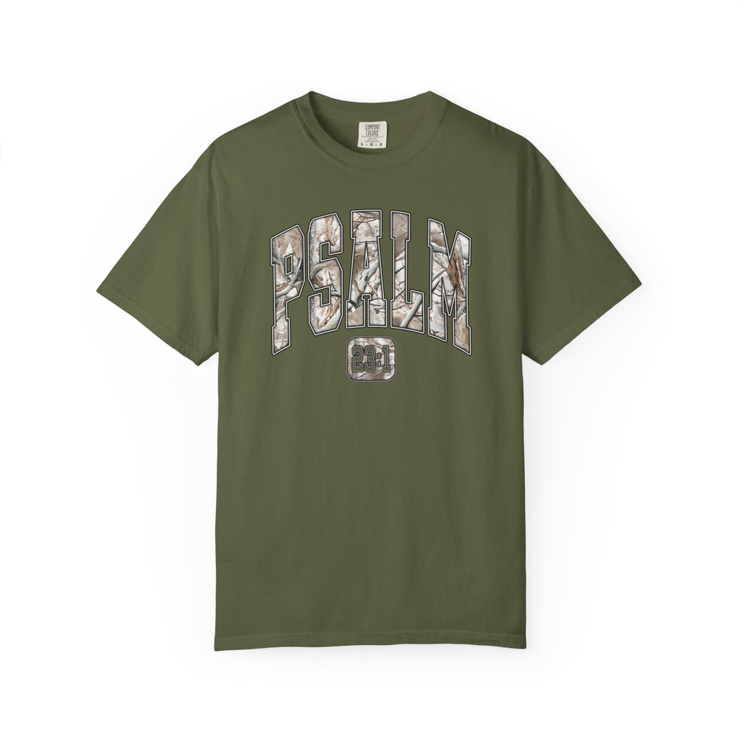 Camo Psalm 23 Tee: Olive-green T-shirt featuring “PSALM 23:1” in camouflage print, embodying comfort and style with a relaxed fit for all genders.