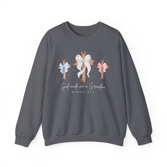 Dark-gray sweatshirt featuring three wooden crosses with bows; center cross has a white bow, flanked by blue and pink bows, with God Made Me a Grandma text.