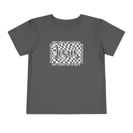 Toddler wearing What a Friend We Have in Jesus tee, showcasing the soft, light fabric and tear-away label of this custom Bella Canvas short sleeve shirt.