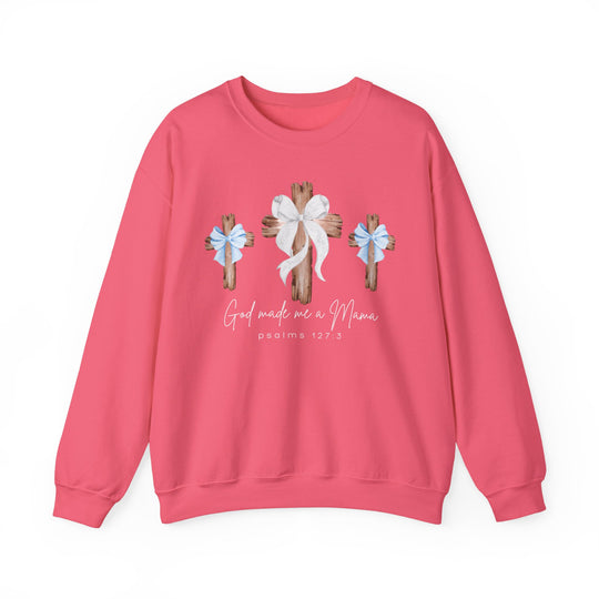 “God Made Me a Mama” pink sweatshirt with three wooden crosses and bows, designed by Faith Family Designs, combining comfort with meaningful graphics.