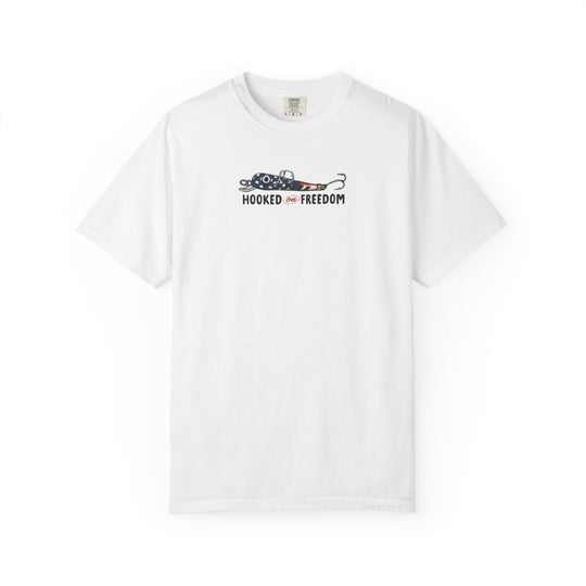 Hooked on Freedom Tee: White short-sleeve t-shirt featuring a stars-and-stripes fishing hook graphic with the slogan 'HOOKED on FREEDOM' on the chest.