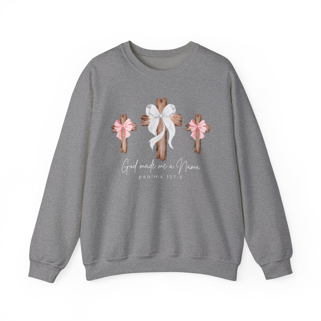 Heather-gray sweatshirt with God Made Me a Nana design, featuring three wooden crosses with bows, combining comfort and faith inspiration.