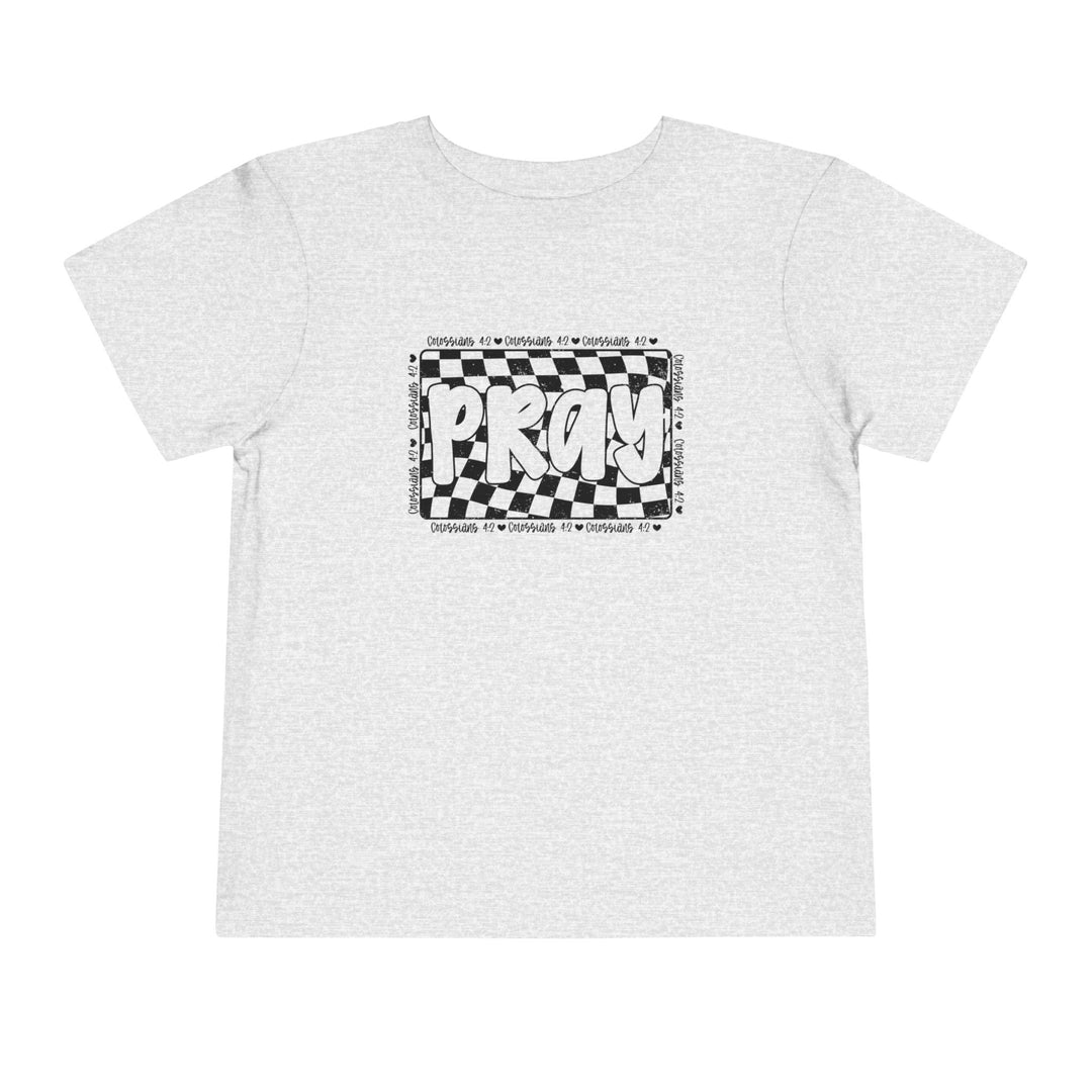 Pray Toddler Tee: A white t-shirt featuring a black and white design, crafted from 100% Airlume combed cotton, perfect for everyday toddler wear.