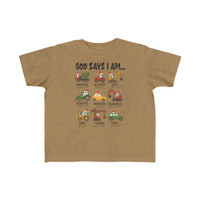 God Says Christmas Truck Toddler Tee features cartoon vehicles with Santa hats and positive traits, offering a soft, durable fit perfect for toddlers.