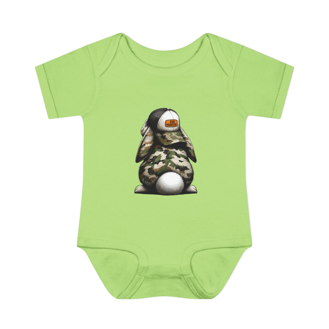 Egg Hunter Onesie: A green baby bodysuit featuring a cartoon bunny in a hat, designed for comfort with soft, ring-spun cotton and practical lap shoulders.