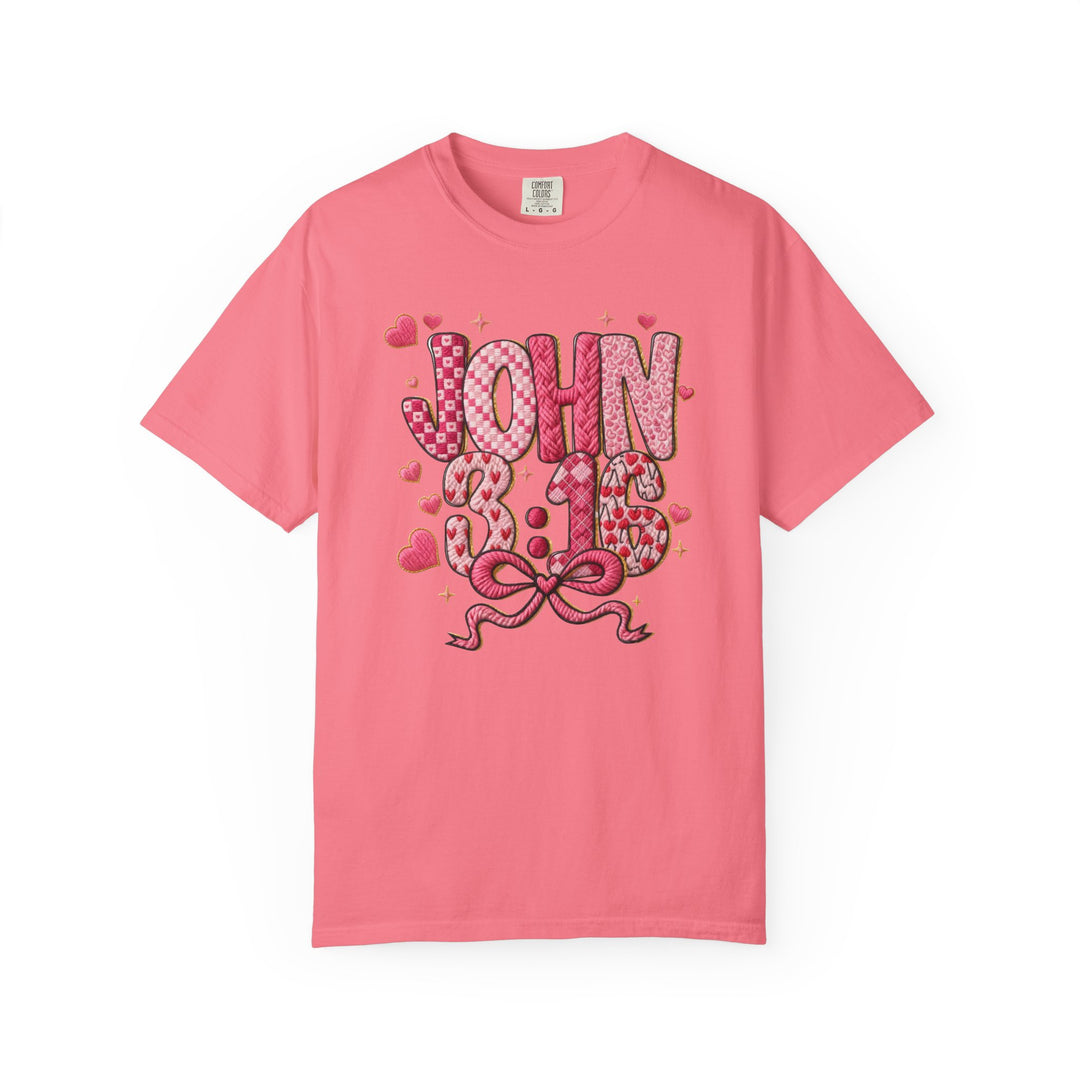 Pink 3:16 Tee with heart-patterned JOHN 3:16 graphic, adorned with floating hearts, sparkles, and a ribbon bow, showcasing Faith Family Designs' unique style.