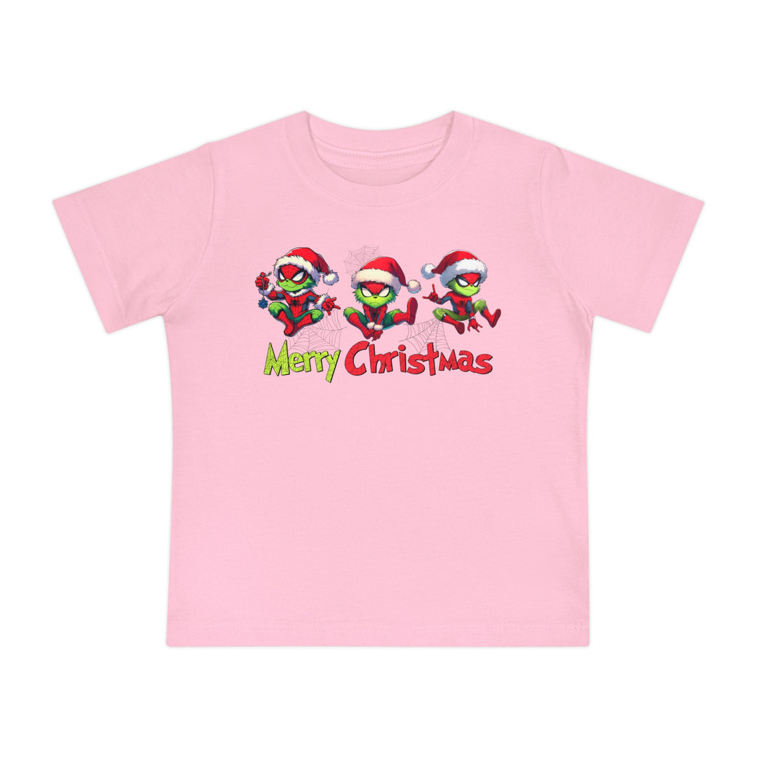 Spider Baby Tee: Pink children's t-shirt with festive cartoon Grinch figures in Spider-Man outfits and Santa hats, featuring Merry Christmas in playful letters.