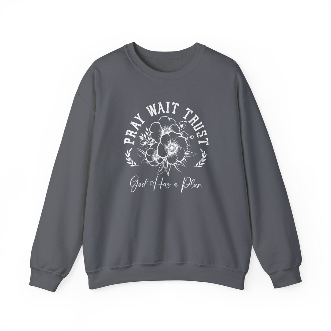 Pray Wait Trust Crew sweatshirt, grey with white text and floral accents, unisex heavy blend, ribbed collar, no side seams, ideal for comfort and style.