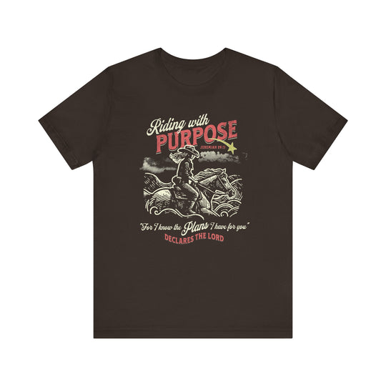 Riding for a Purpose Tee: A black t-shirt featuring a graphic of a man on a motorcycle, crafted from soft cotton with a comfortable unisex fit.