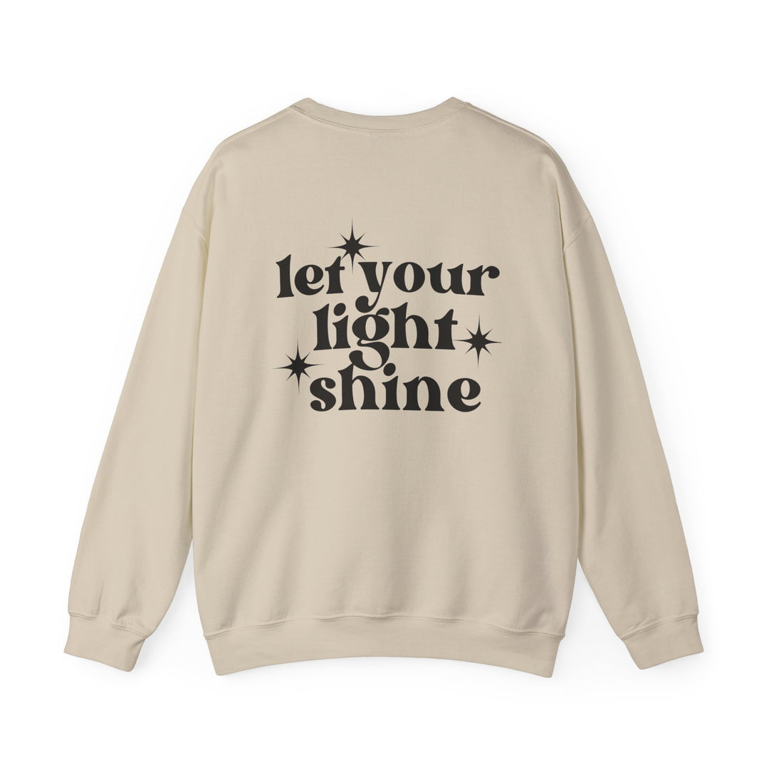 A tan unisex crewneck sweatshirt with black text, featuring a comfortable, medium-heavy fabric blend of 50% Cotton and 50% Polyester. Ribbed knit collar, loose fit, and no itchy side seams. Ideal for all occasions.