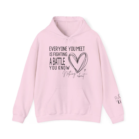 Pale-pink hoodie with a heart and motivational text on chest, EVERYONE YOU MEET IS FIGHTING A BATTLE YOU KNOW NOTHING ABOUT.