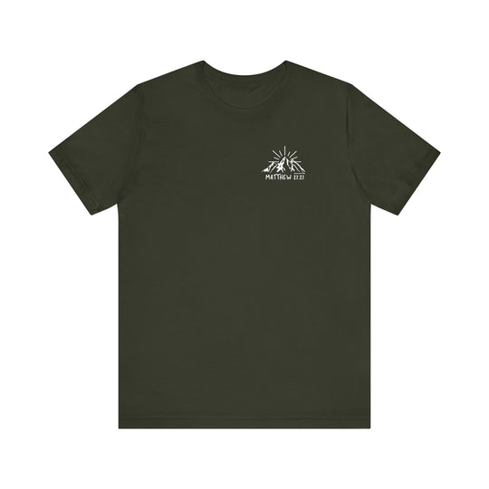 A unisex green tee with a mountain logo, embodying strength and faith. Made of soft, 100% cotton, featuring ribbed knit collars and taping for a comfortable fit. From Worlds Worst Tees.