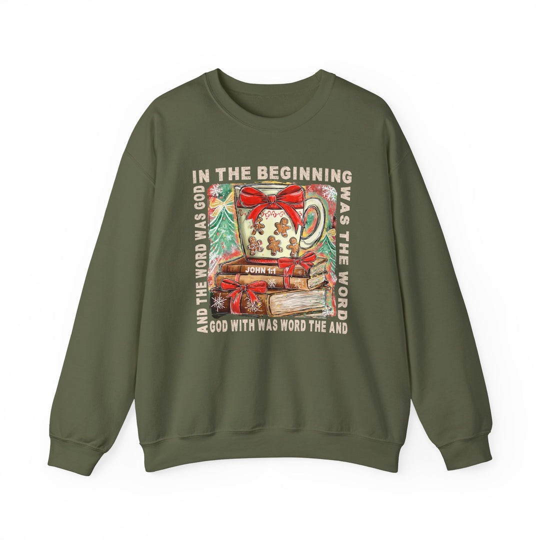 Olive-green crewneck sweatshirt featuring a Christmas graphic with a mug, gingerbread decoration, gift-wrapped books, and a biblical quote, titled In the Beginning Crew.