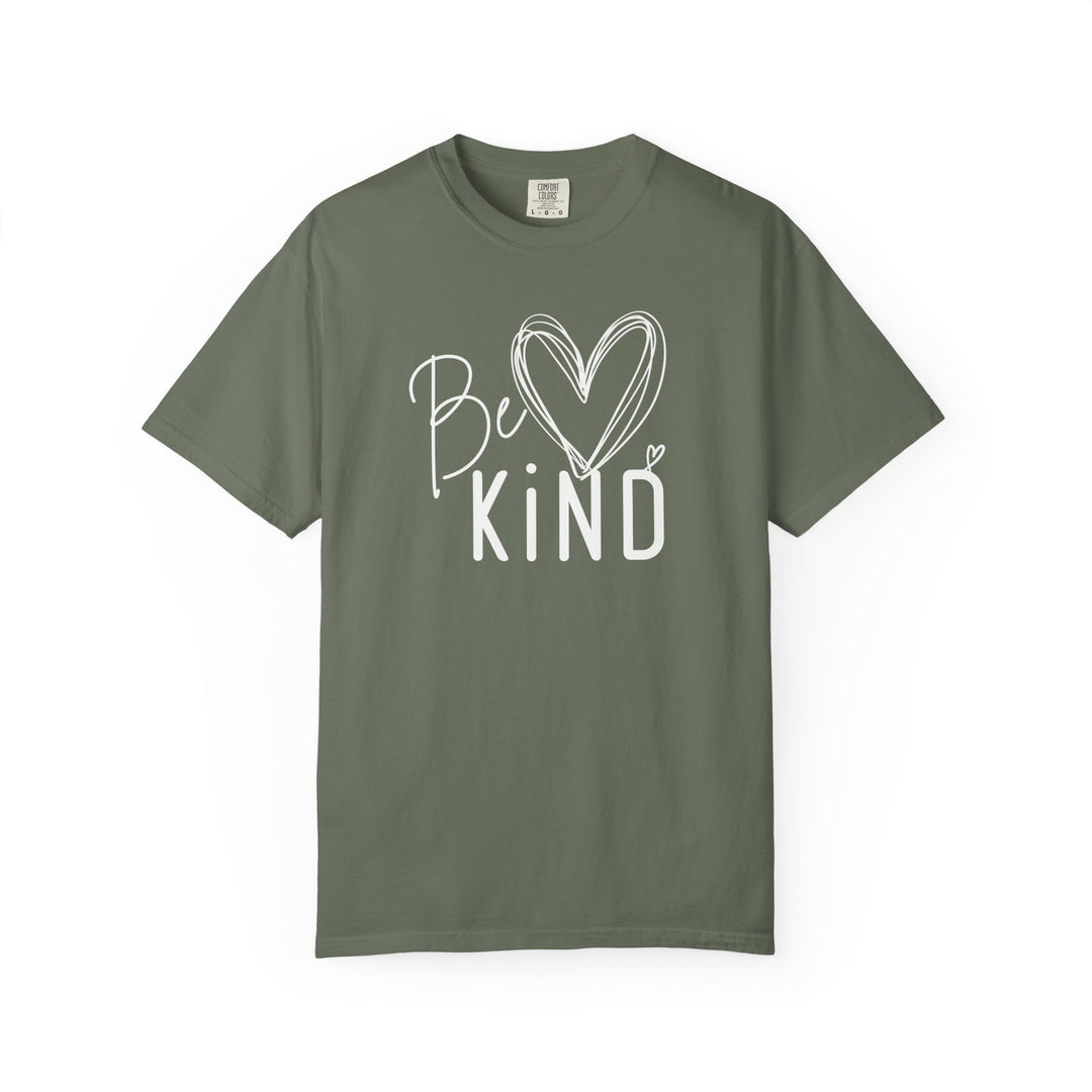Olive-green Be Kind tee with script and block lettering, featuring a heart design, offering a relaxed fit ideal for casual wear.