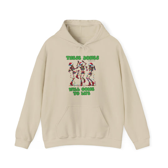 Bones Come to Life Hoodie with festive skeletons in Santa hats, wrapped in Christmas lights, featuring Ezekiel 37:4-5 in green bubble letters. Cozy, unisex design.
