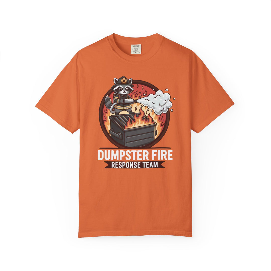 Orange tee featuring a cartoon raccoon in firefighter gear battling a flaming dumpster, with 'Dumpster Fire Response Team' text below.