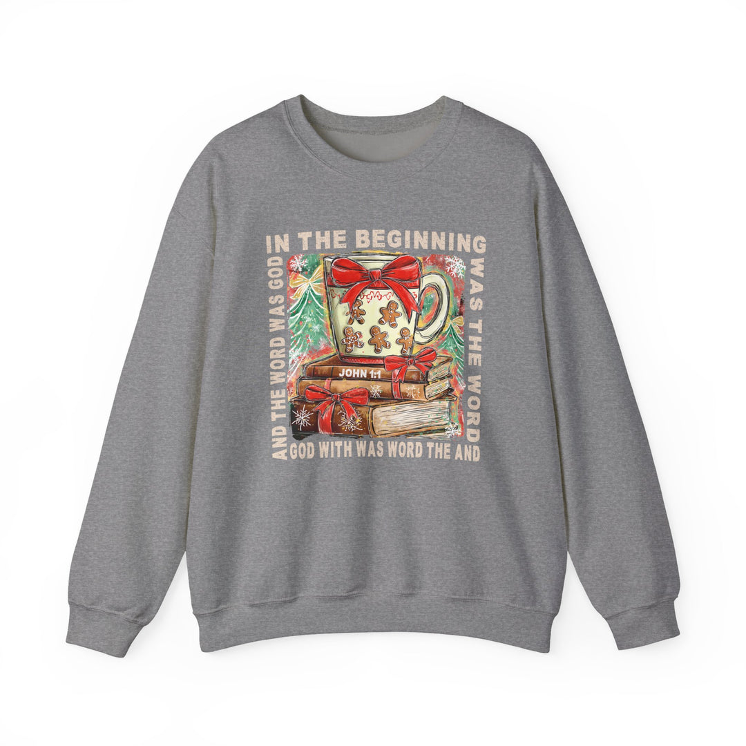 Grey crewneck sweatshirt, In the Beginning Crew, featuring a festive mug and books with John 1:1 scripture, surrounded by evergreen branches and snowflakes.