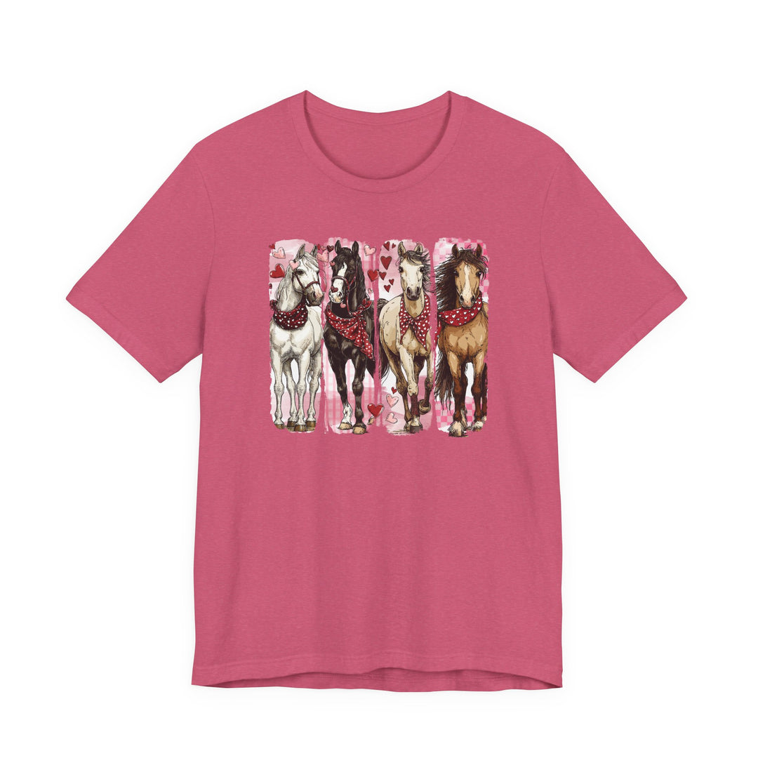 Horse Valentine Tee featuring four horses with heart-patterned bandanas, set against a heart-decorated background. Made of soft pink cotton for a comfortable, classic fit.