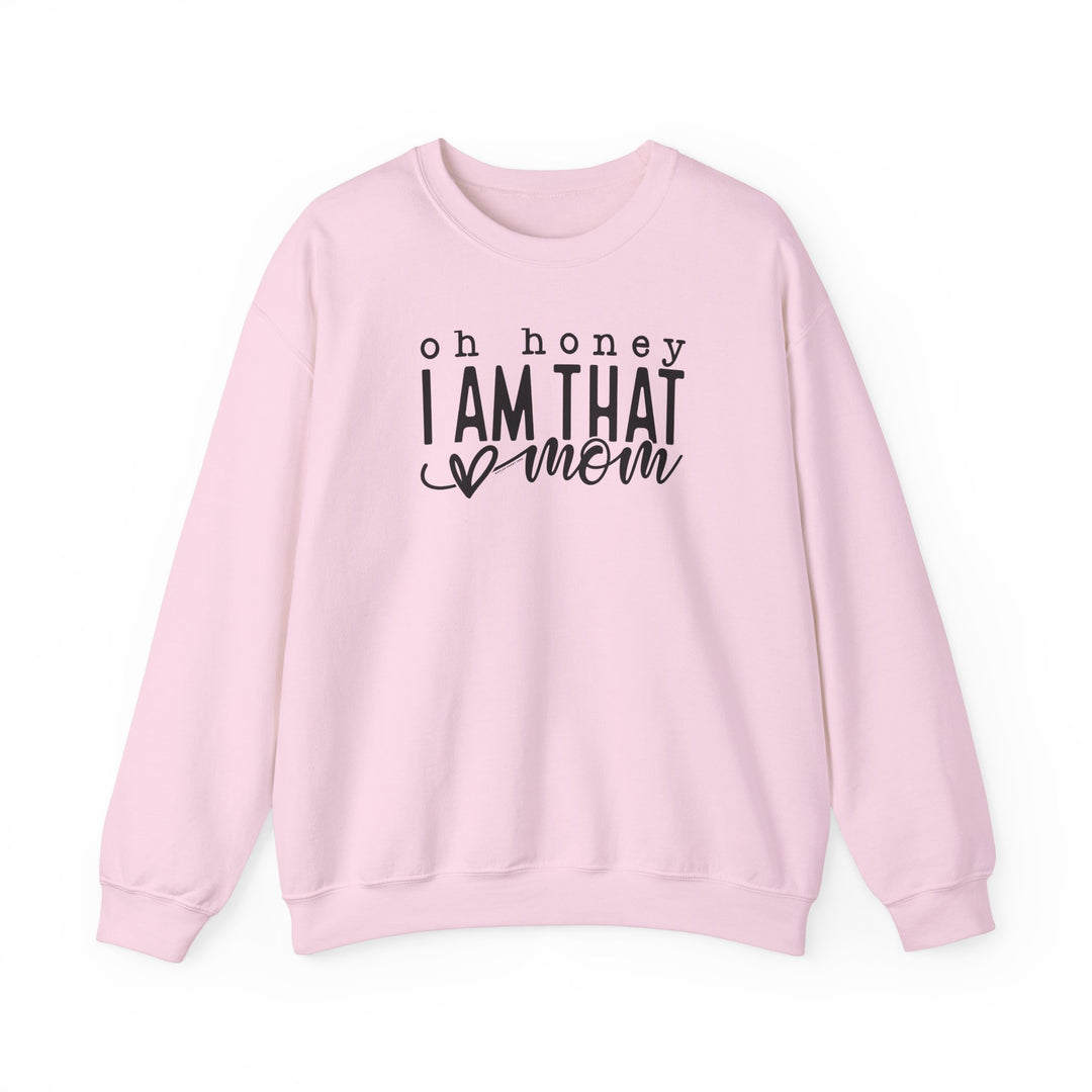 Unisex heavy blend crewneck sweatshirt, Oh Honey I'm that Mom Crew. Pink with black text. Ribbed knit collar, no itchy side seams. 50% cotton, 50% polyester. Medium-heavy fabric, loose fit.
