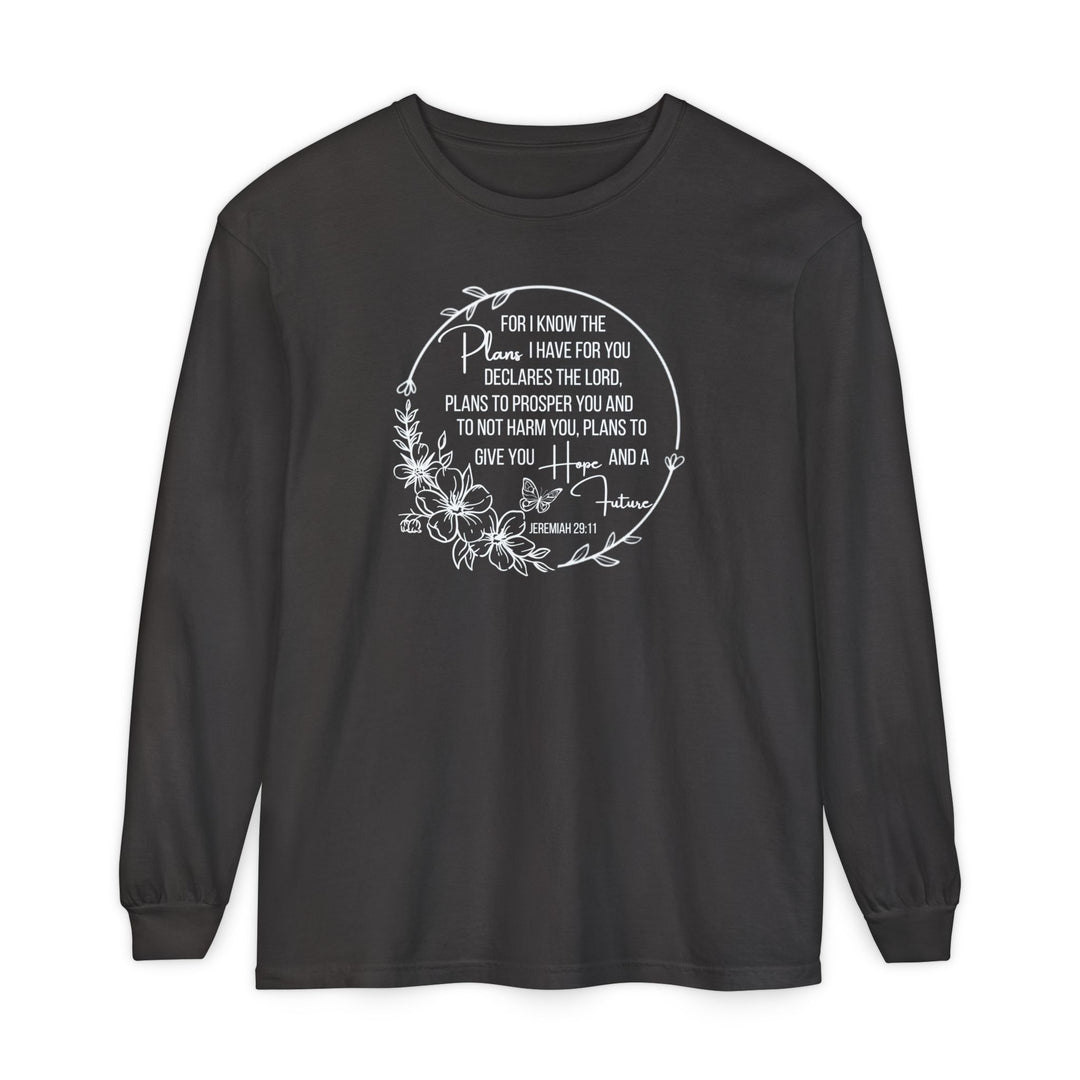 Black long-sleeve tee featuring a white floral wreath around Jeremiah 29:11, made of 100% ring-spun cotton for comfort.