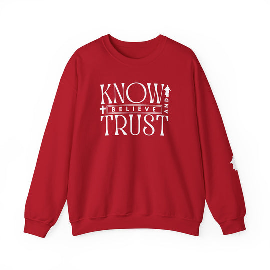 Trust, Know, Believe Crew: Red sweatshirt with white text, featuring a classic fit and crew neckline, made from a cozy cotton-polyester blend for comfort and durability.