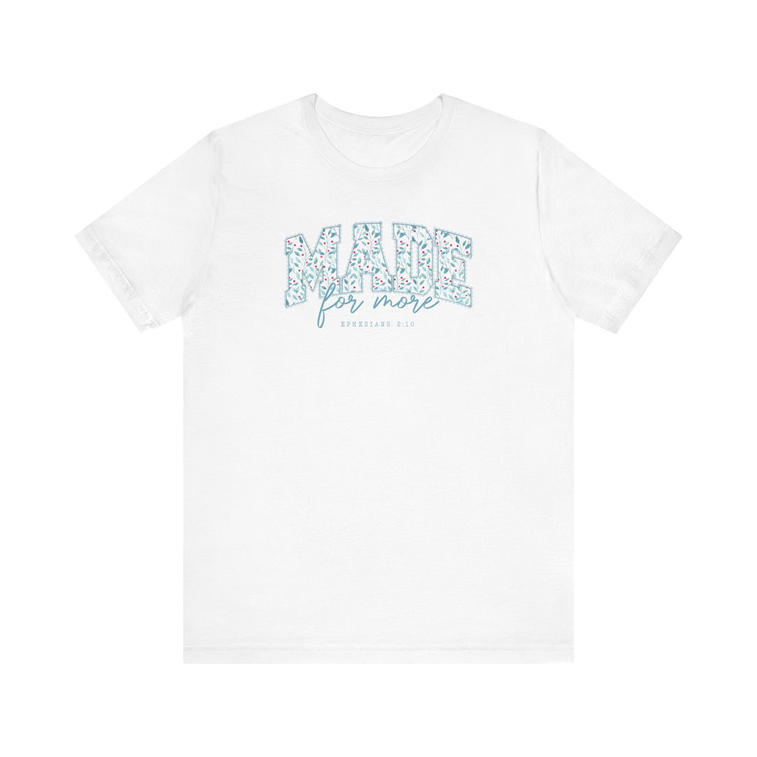 White short-sleeve T-shirt with MADE for more in floral letters, referencing EPHESIANS 2:10, showcasing Faith Family Designs' emphasis on meaningful, stylish apparel.