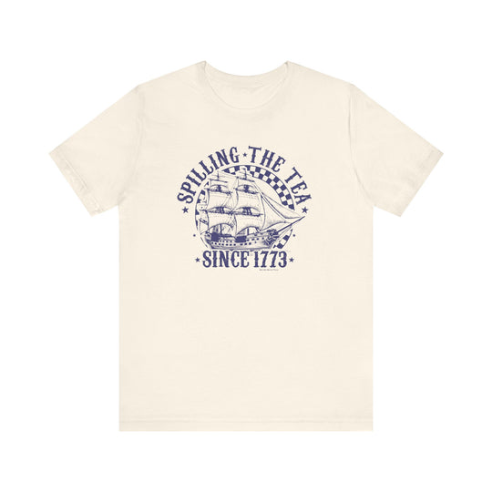 White tee with blue sailboat graphic and text, part of the Spilling the Tea Since 1773 collection by Worlds Worst Tees. Unisex jersey tee, 100% cotton, ribbed knit collar, retail fit.