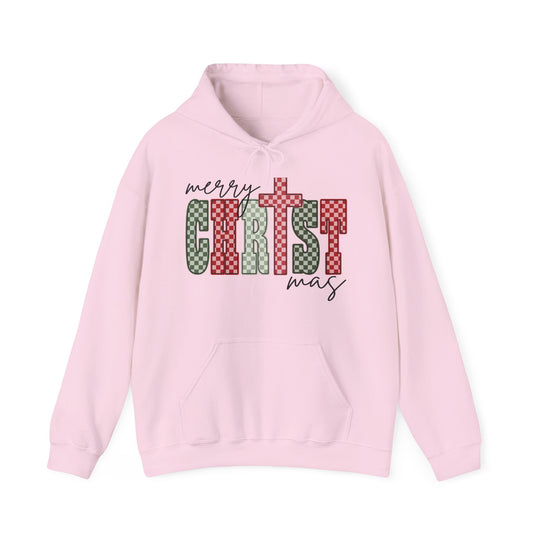 Light-pink Christmas Hoodie featuring a merry Christmas graphic with a checkerboard pattern, kangaroo pocket, and drawstring hood, offering warmth and style.