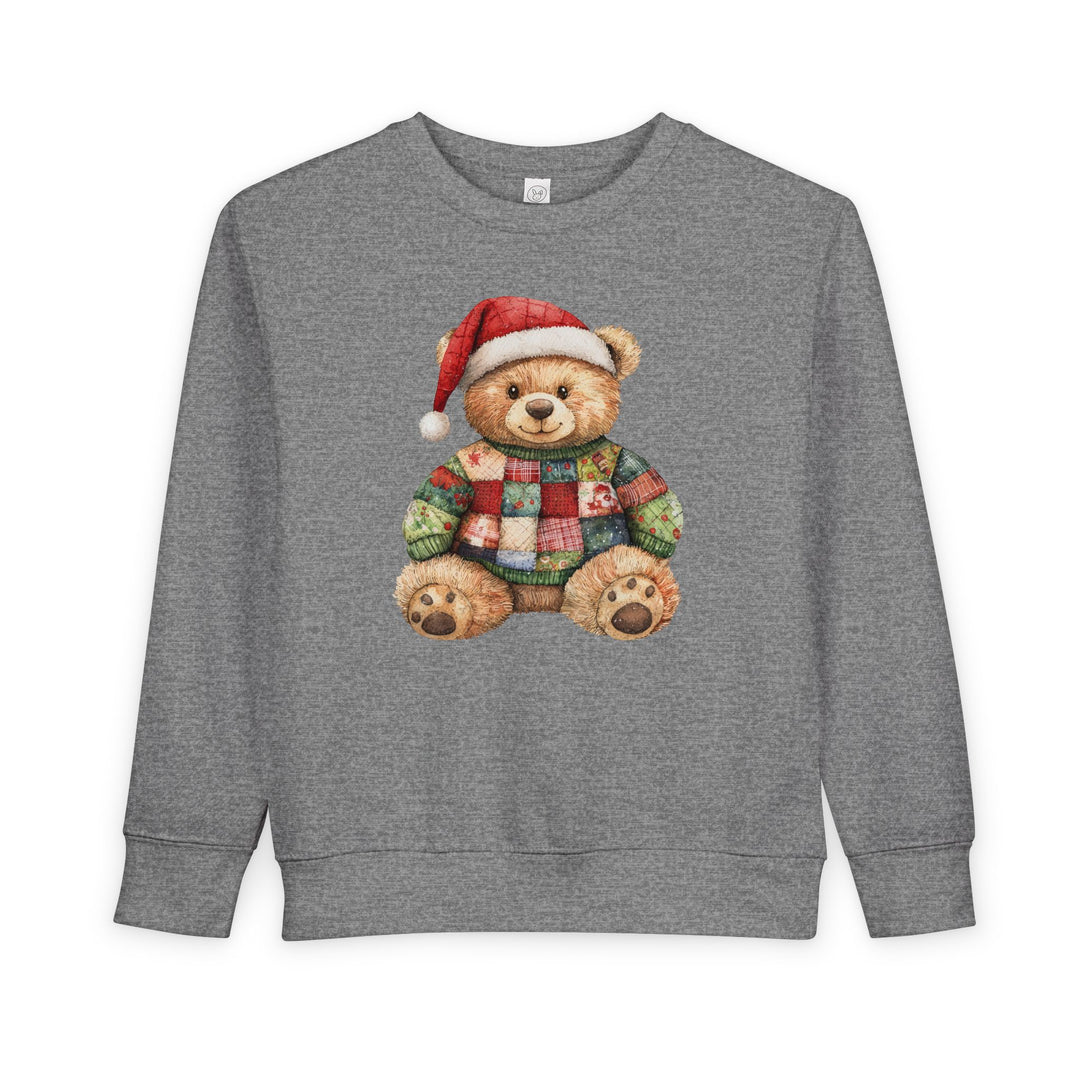 Grey crewneck sweatshirt featuring a teddy bear in a red-and-green sweater and Santa hat, designed for toddler warmth and comfort with durable, soft fabric.