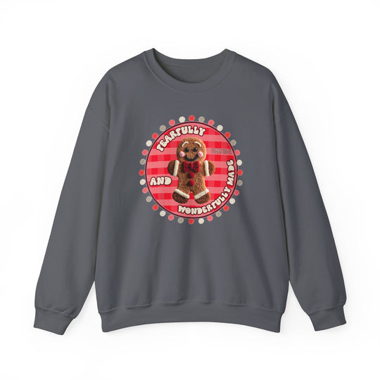 Wonderfully Made Crew: Charcoal-gray sweatshirt with a smiling gingerbread man graphic and inspirational text, offering cozy comfort and durable, ethical craftsmanship.